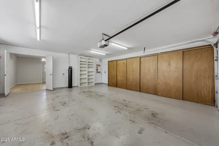 Built in Cabinets ready for storage. A BRAND NEW water softener was just installed. Double doors lead to Laundry Room.