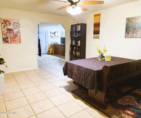 Living Room View from Front Door to Kitchen/Great Room (Seller uses it for their Dining Table)