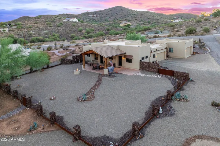 View of the back of the property and garages