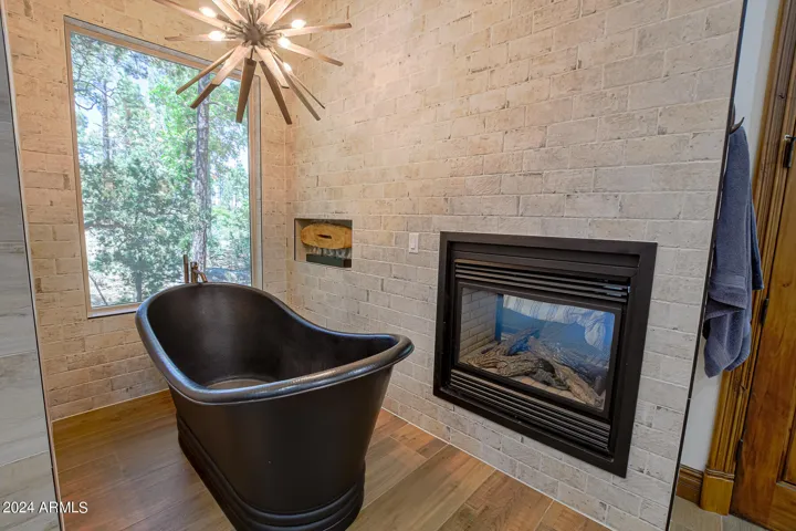 Full tile surround highlights this amazing deep soaker tub. Yes Please!