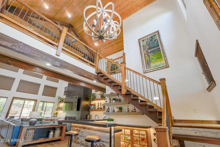 Beautiful entry with custom lighting to welcome you home