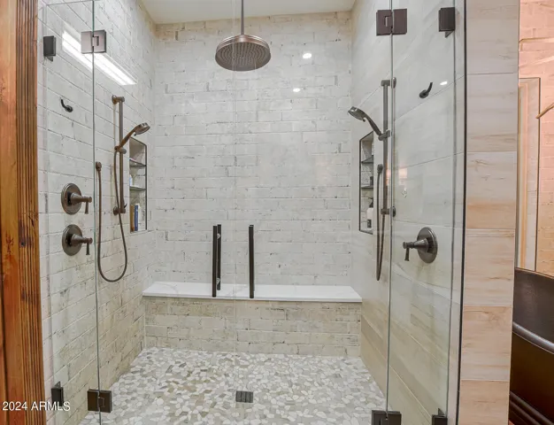 Adjustable slide bars and large rain shower are an incredible addition
