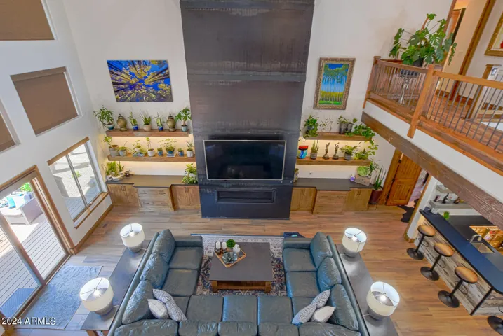 Overhead view of the great room from the loft. Entire main level is tile