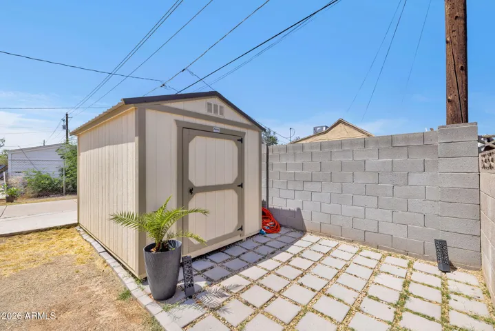 Storage Shed with Paver Pathway