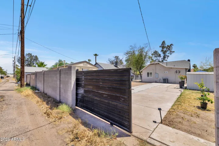 Gated Rear Entry with Driveway Access