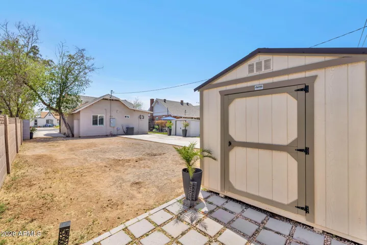 Backyard with Storage Shed and Open Space