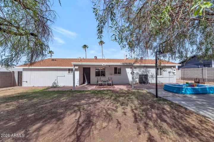 Spacious back yard w/Sport Court and RV Gate!