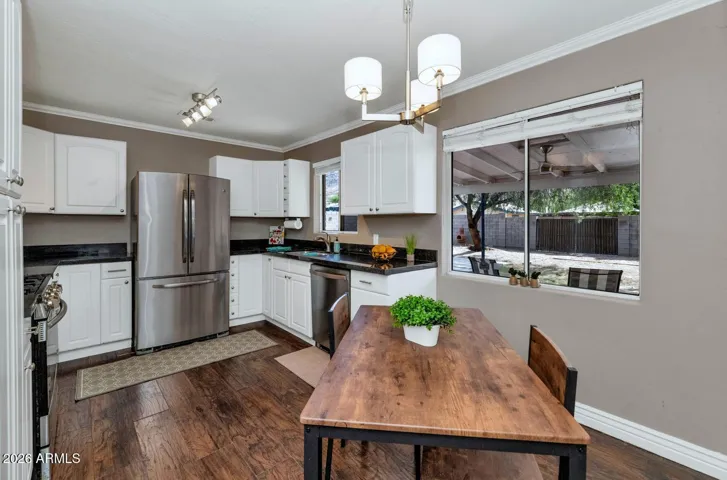 Kitchen has great views into backyard
