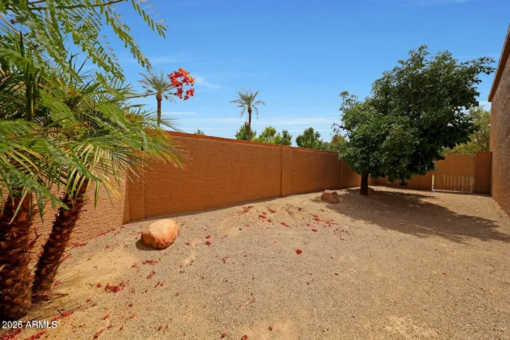 Corner lot provides private side yar with mature fruit tree or space for pets to roam