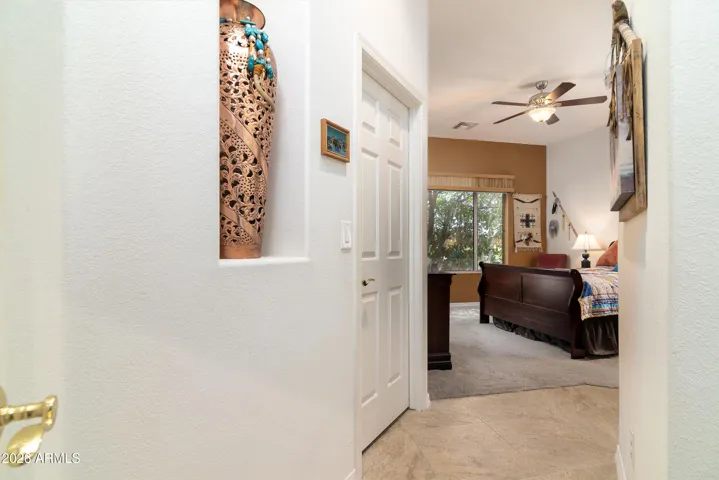 Hallway to primary bedroom