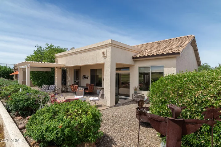 rear view of patio and home
