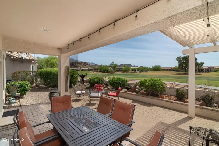 Covered back patio with golf course view
