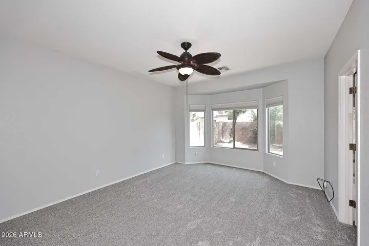Primary has ceiling fan for added energy efficiency