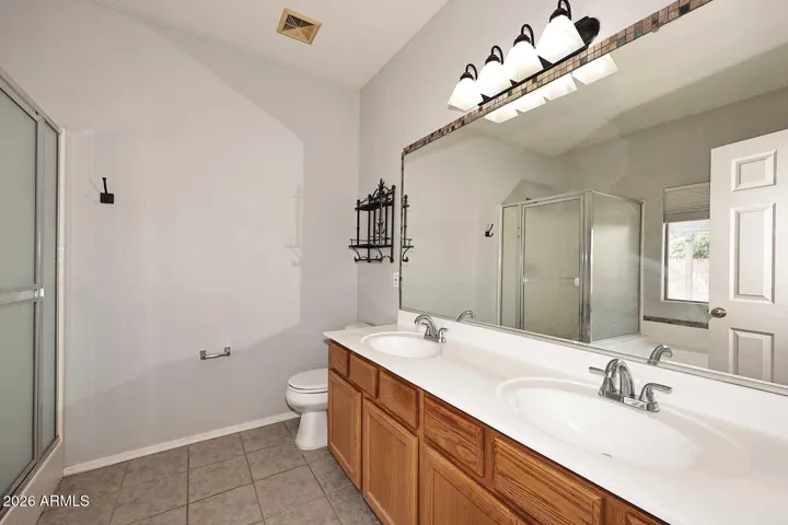 Primary bath has double sinks