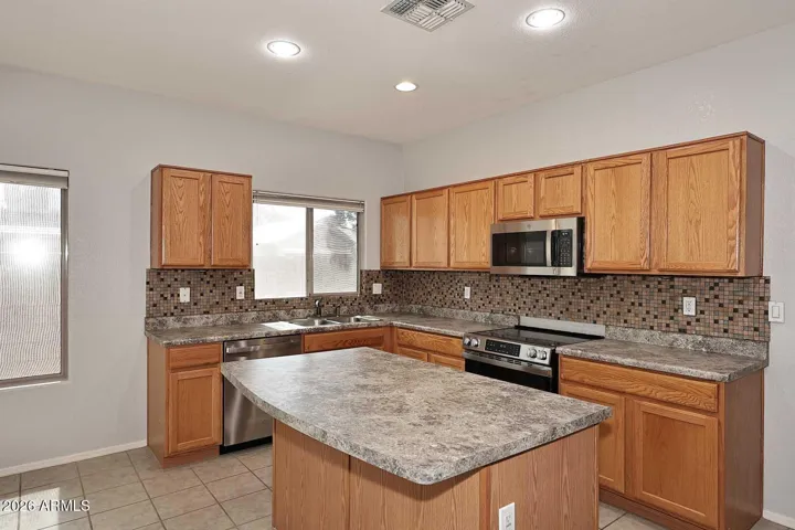 Kitchen features NEW SS appliances