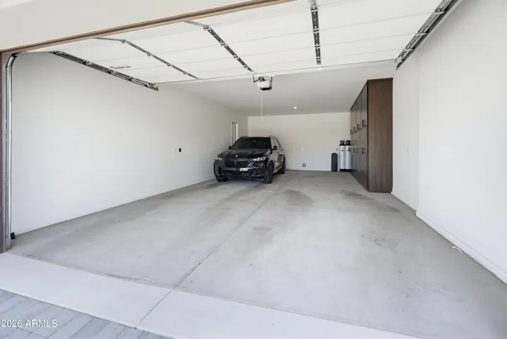 4 Vehicle Tandem Garage w/ Custom Built-In Storage