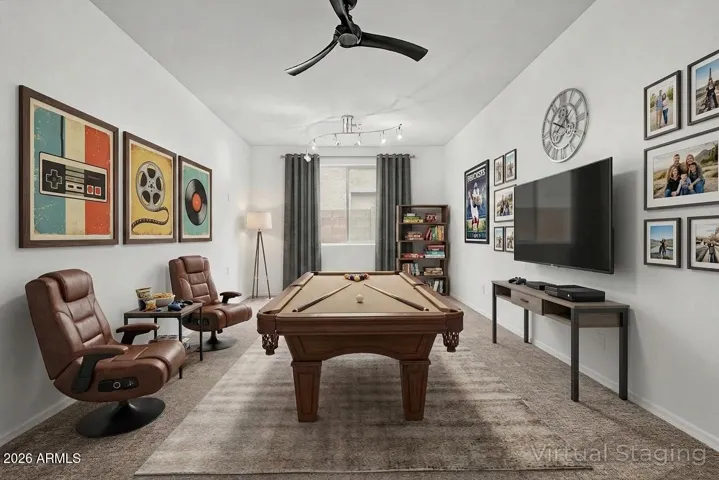 Den virtually staged as a game room
