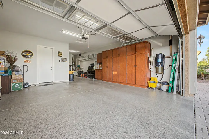 Huge 3 car Garage with epoxy flooring