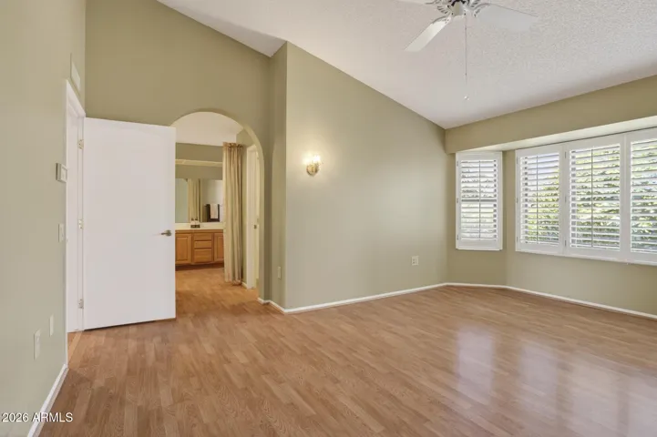 A bay window offers lots of light and a space for some chairs or a couch.
