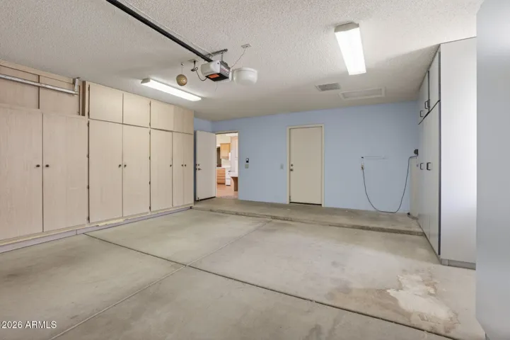 2 doors lead from the garage into the kitchen and laundry areas.