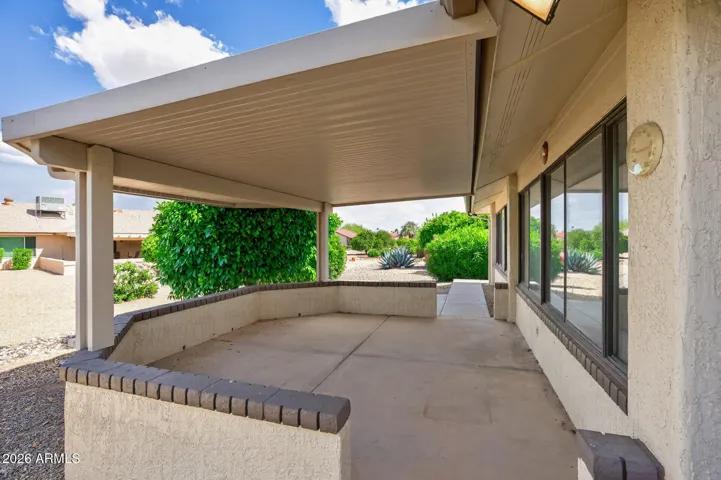 Enjoy sitting in the sun or under the covered patio.