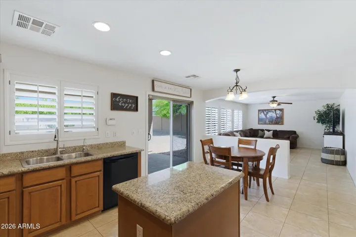 The open kitchen and family room create a a comfortable spot to to gather, cook, and relax.