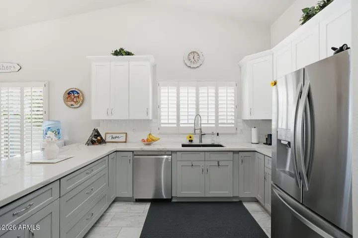 Gorgeous Quartz countertops in this spacious kitchen