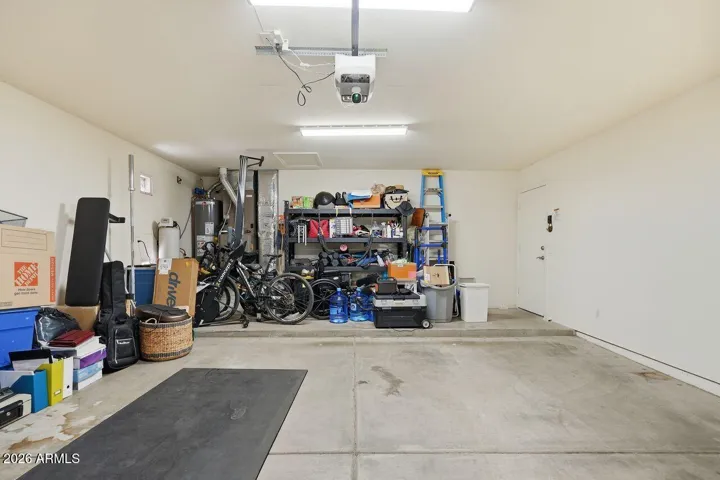 Two car garage with plenty of storage space