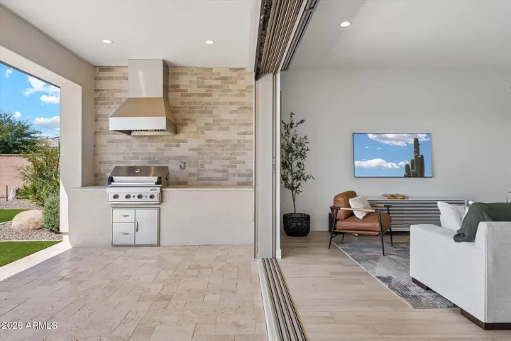Indoor Outdoor living and patio with motorized shade