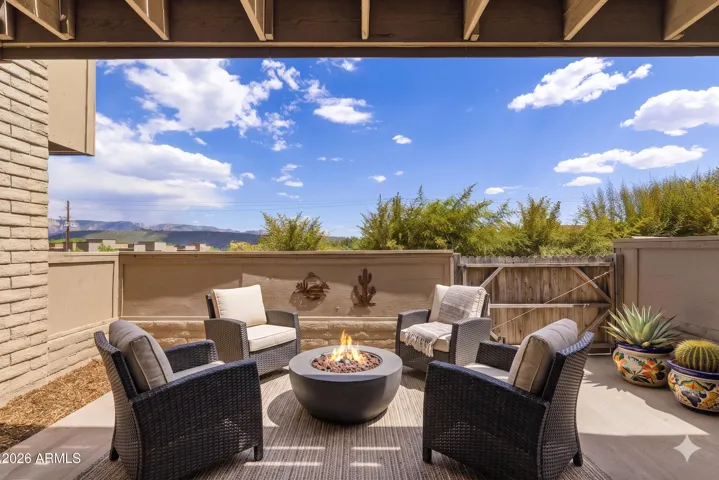First Floor Patio off Living Room. Great for entertaining and star gazing. [photo with virtually staged furnishings]