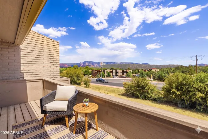 Lovely Upper Deck with great red rock off the Primary Bedroom Suite [photo with virtually staged furnishings]