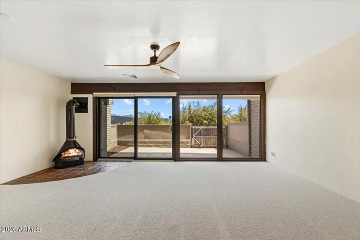 Enjoy the cozy, wood burning Fireplace and Brand New Carpets upstairs and down.