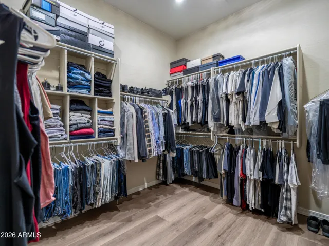 New flooring in primary suite walk-in closet