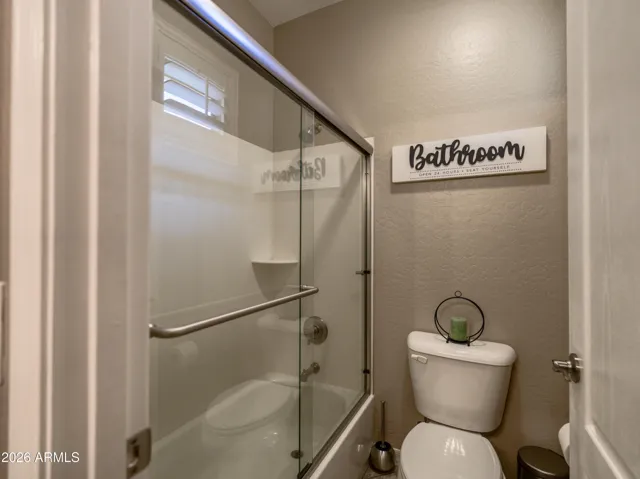 Shower and toilet in separate room in hall bath