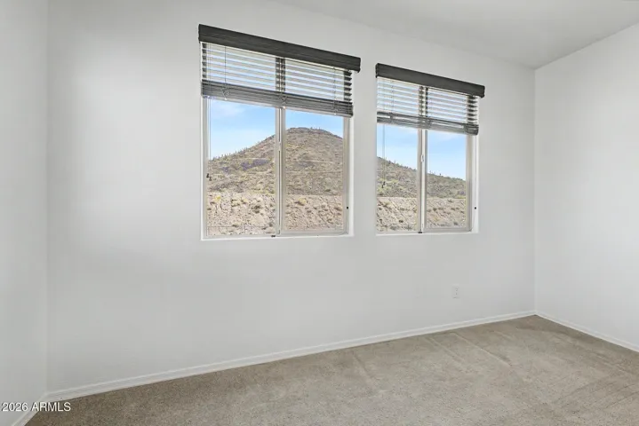 Primary Bedroom + Mountain Views