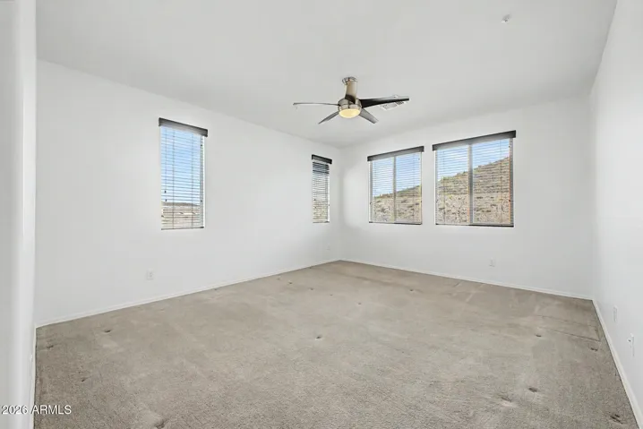 Primary Bedroom + Mountain Views