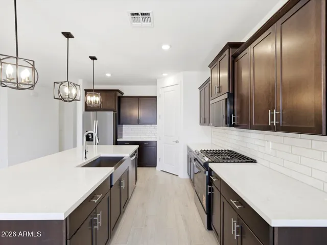 Photo is not of the actual home. Interior finishes and fixtures may vary.