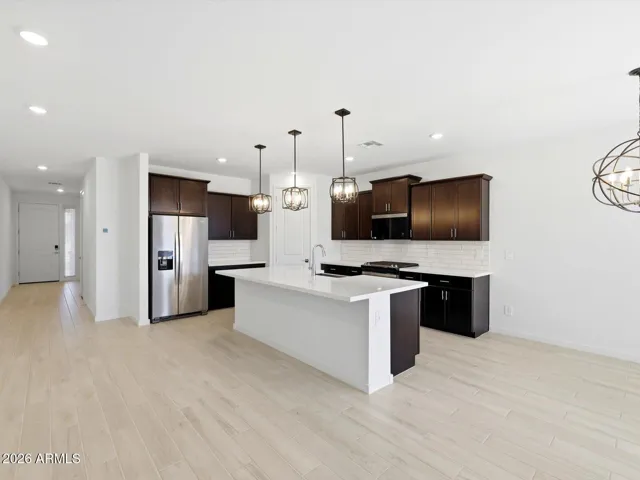 Photo is not of the actual home. Interior finishes and fixtures may vary.