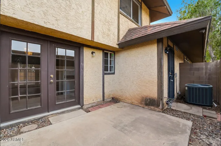 French doors leading to back patio