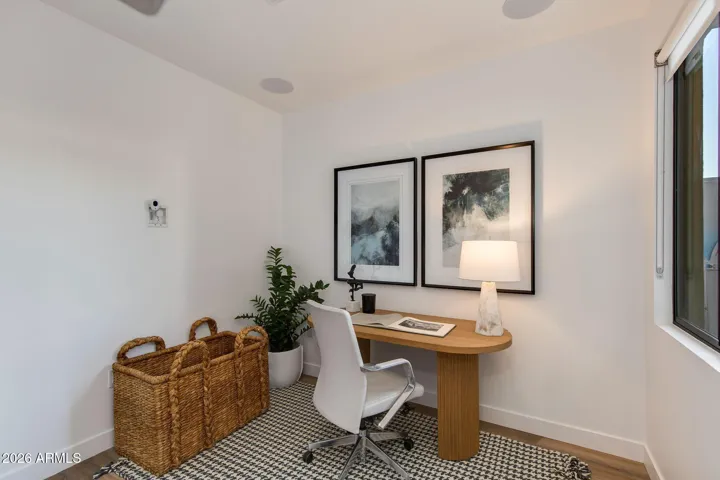Bedroom 1 on the ground level makes for the perfect office or bonus space