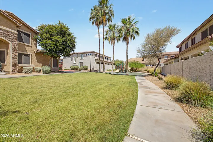 Impeccably maintained, community walking paths and green spaces.