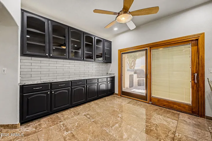 Dining Area | Pella Sliding Glass Door | Buffet Bar with Upper and Lower Cabinetry and Drawers