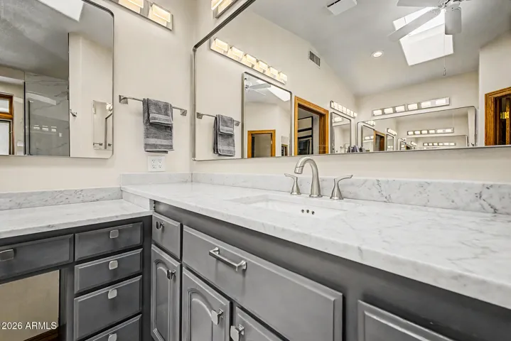 Two Large Skylights | Raised-Height Dual Vanities | Granite Countertops