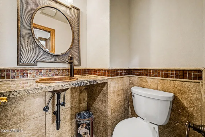 Granite Countertop with Tile Surround | Comfort-Height Toilet