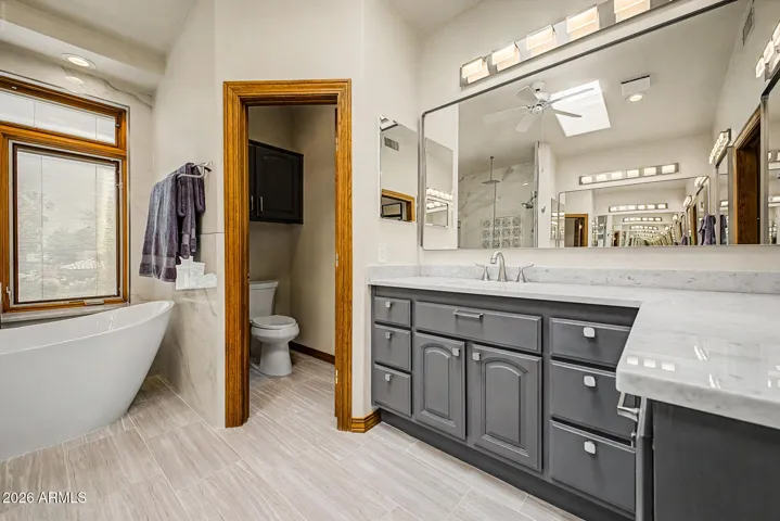 Private Water Closet | Comfort-Height Toilet | Two Large Skylights
