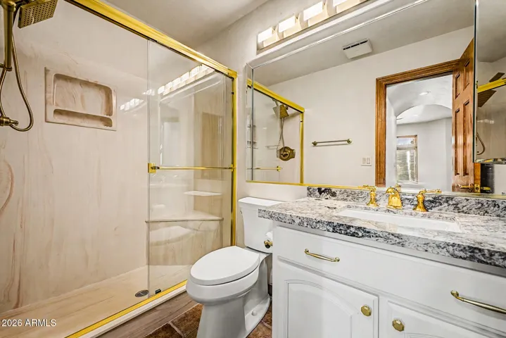 Walk-in Shower w/Glass Enclosure |Comfort-Height Toilet | 2025 Granite Countertop | Faucet | Bathroom Fixtures | 2026 Refinished Cabinetry and Linen Closet w/new hardware and soft-close hinges