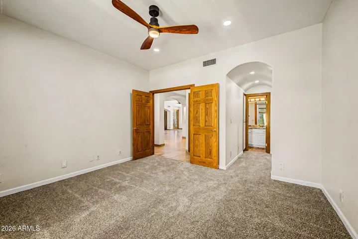 Double-Door Entry | Private Hallway Leading to En-suite Bath