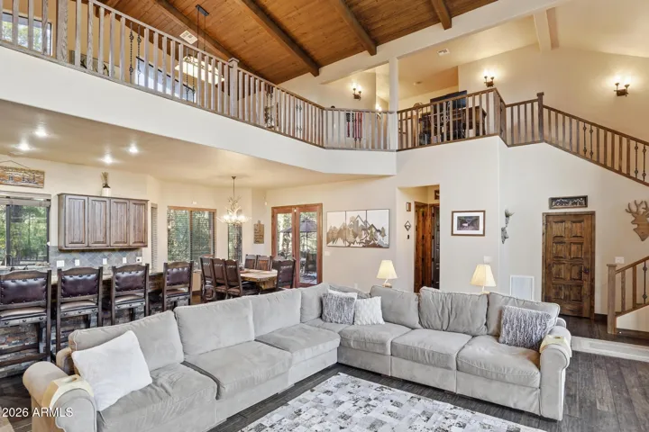 Huge rec room upstairs. Note the exposed beam ceilings with tongue and groove for that classic cabin feel