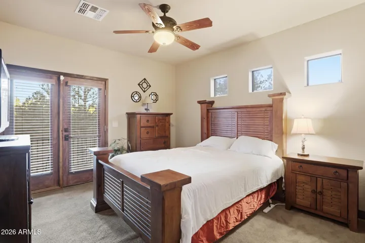 Spacious bedroom has a deck as well.