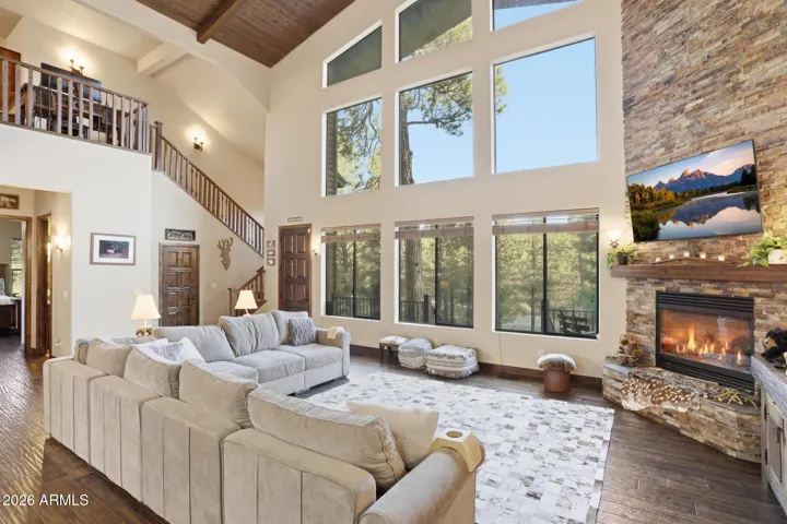 Floor to ceiling fireplace, of course!
